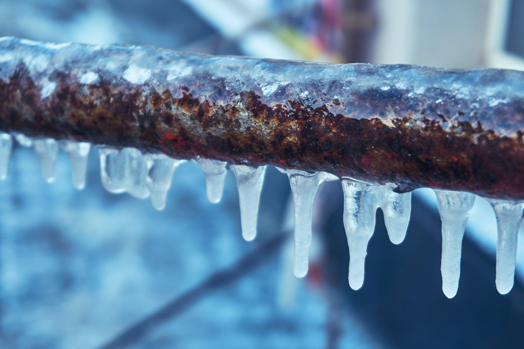 icicles from a metal pipe