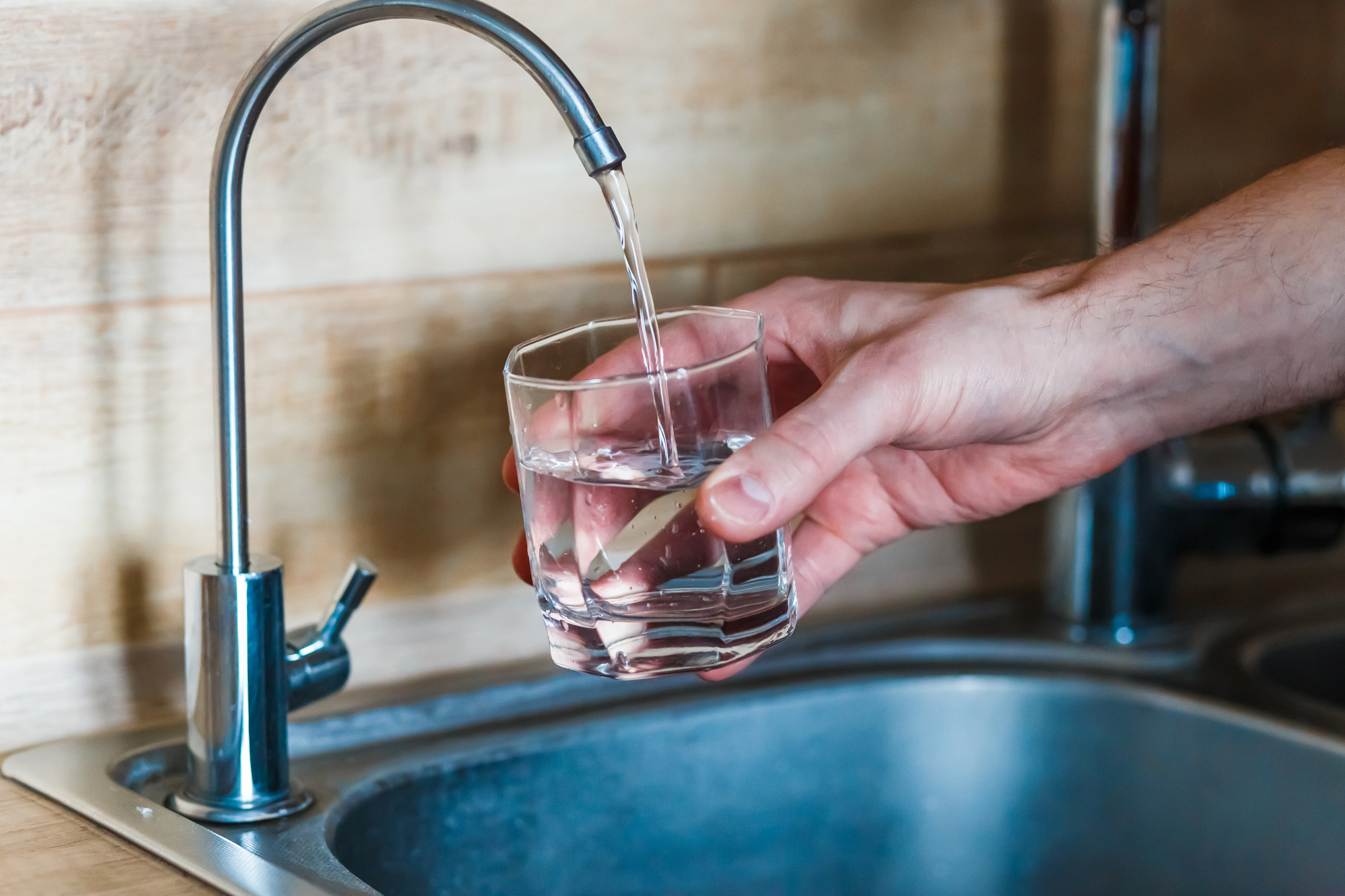filling glass of water